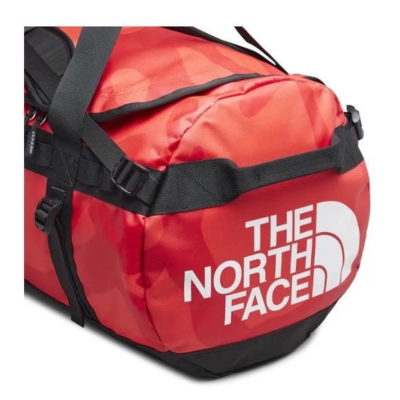 NWT 2022 KAWS x THE NORTH FACE MEDIUM RED DUFFLE BAG BRILLIANT CORAL 86 PRINT - Picture 2 of 8